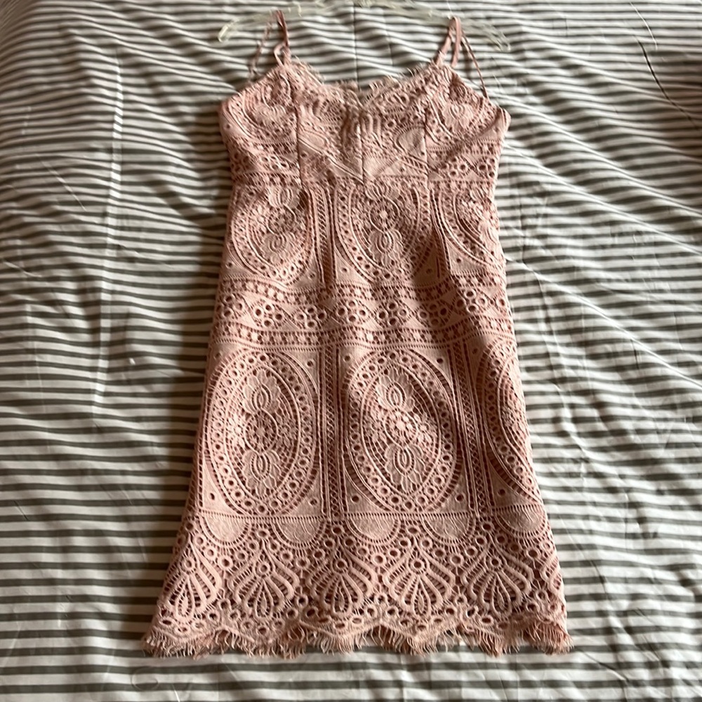 Light Pink Lined Dress size small with adjustable Spaghetti Straps.
